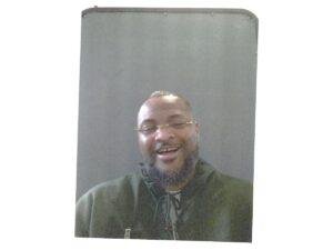 Tony Smith smiling in a portrait photograph